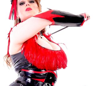 Rubber Tits invites you to browse their xxx photos with juvenile lady in female domination fantasies